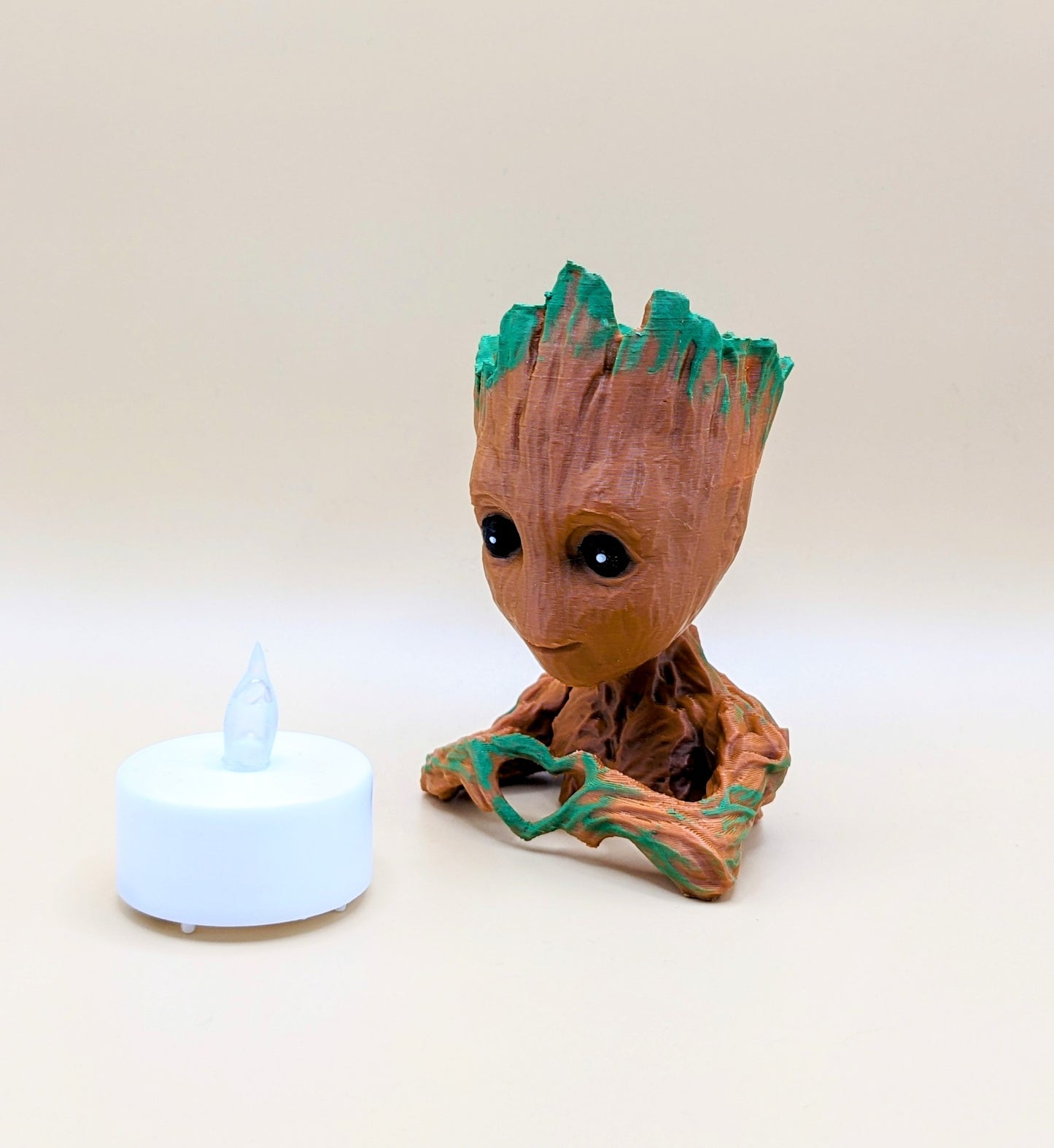 Baby Groot battery operated T light / available in 3 colours, all individually hand painted. These are unique night lights.