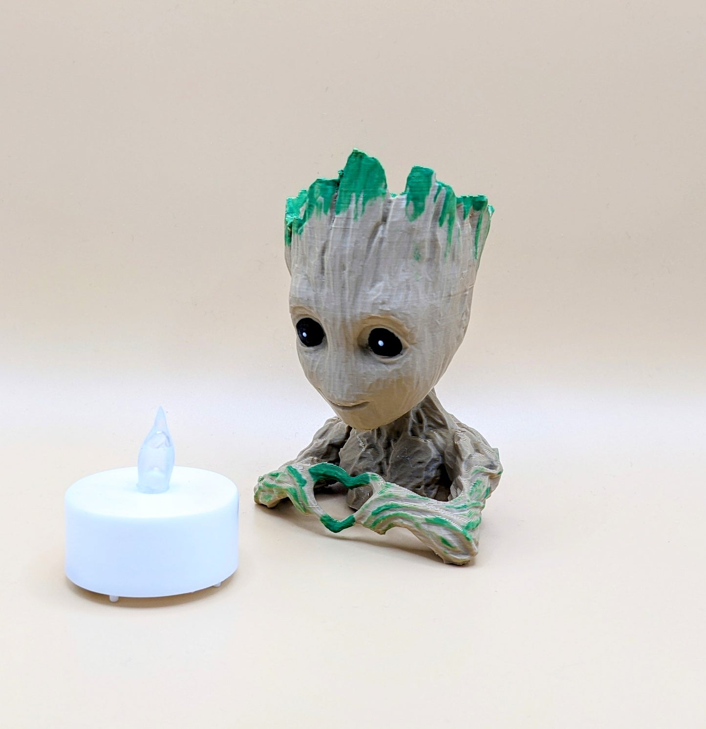 Baby Groot battery operated T light / available in 3 colours, all individually hand painted. These are unique night lights.