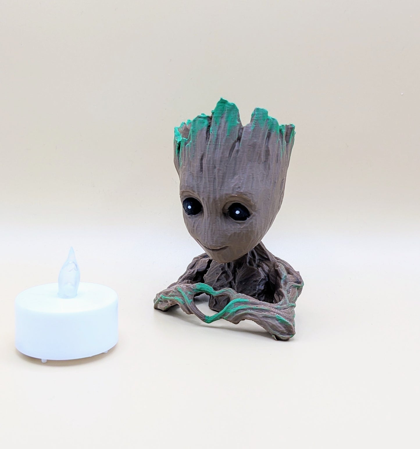 Baby Groot battery operated T light / available in 3 colours, all individually hand painted. These are unique night lights.