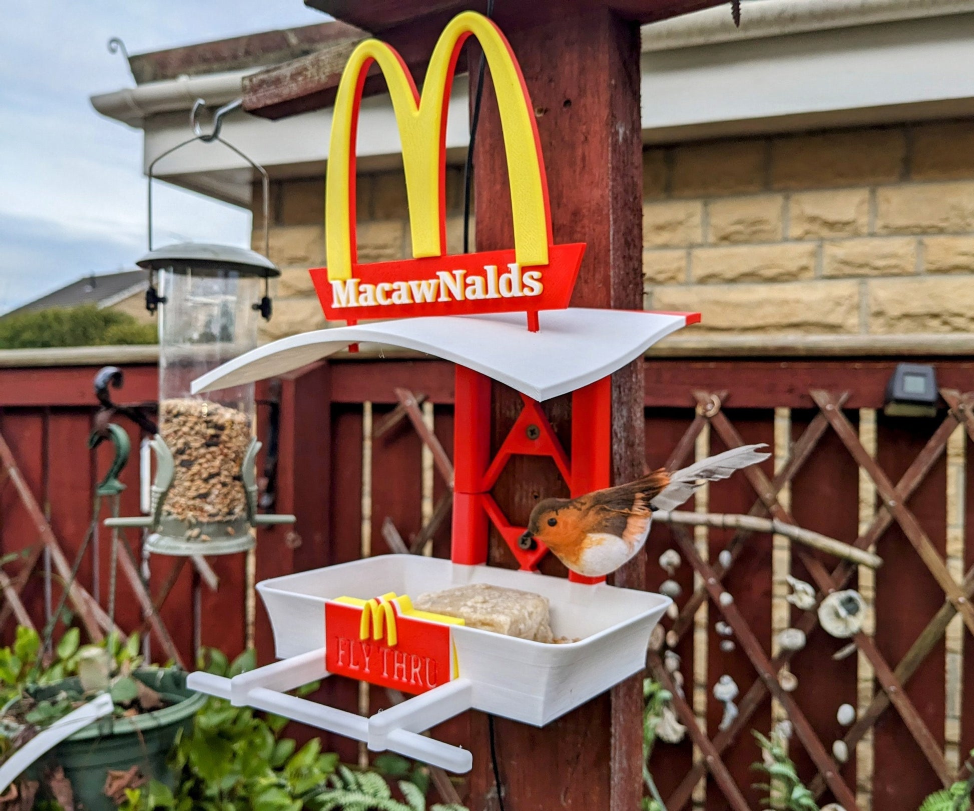 MacawNalds Fly Thru 3d printed bird feeding station. The coolest feeder table takeaway in town for your feathered friends