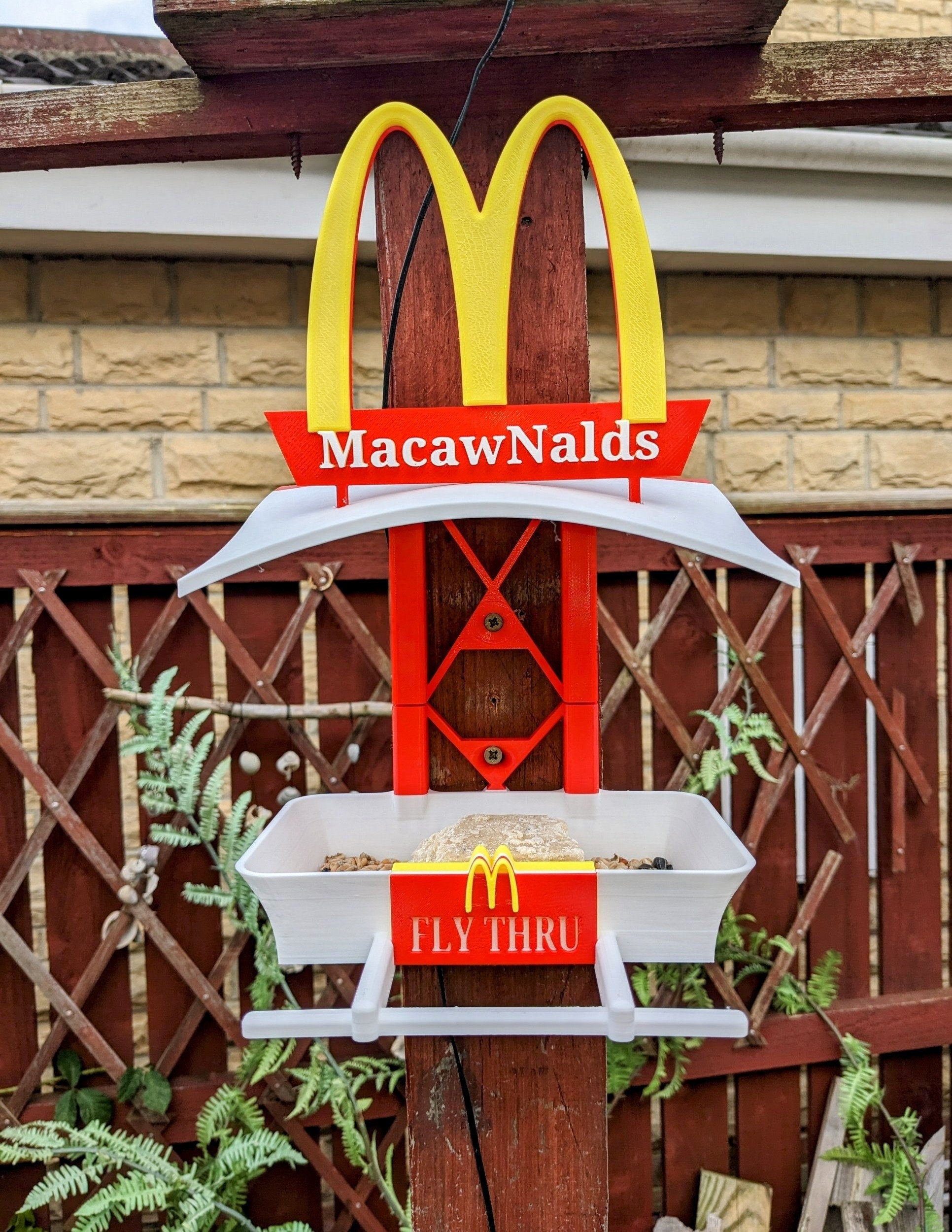 MacawNalds Fly Thru 3d printed bird feeding station. The coolest feeder table takeaway in town for your feathered friends