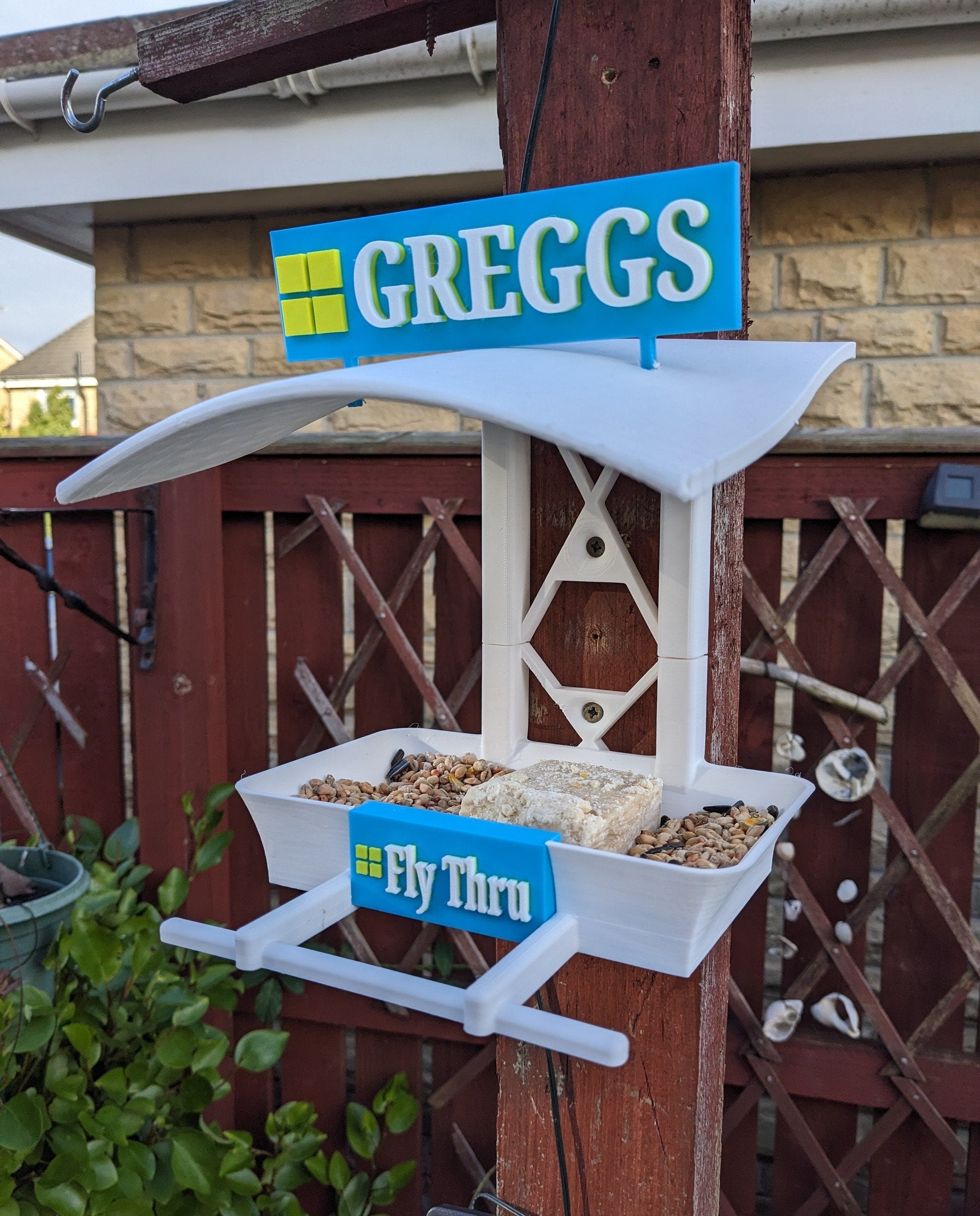 K F C Fly Thru 3d printed bird feeding station. Kentucky fried Corn feeder table for all your feathered friends into fast food takeaways.