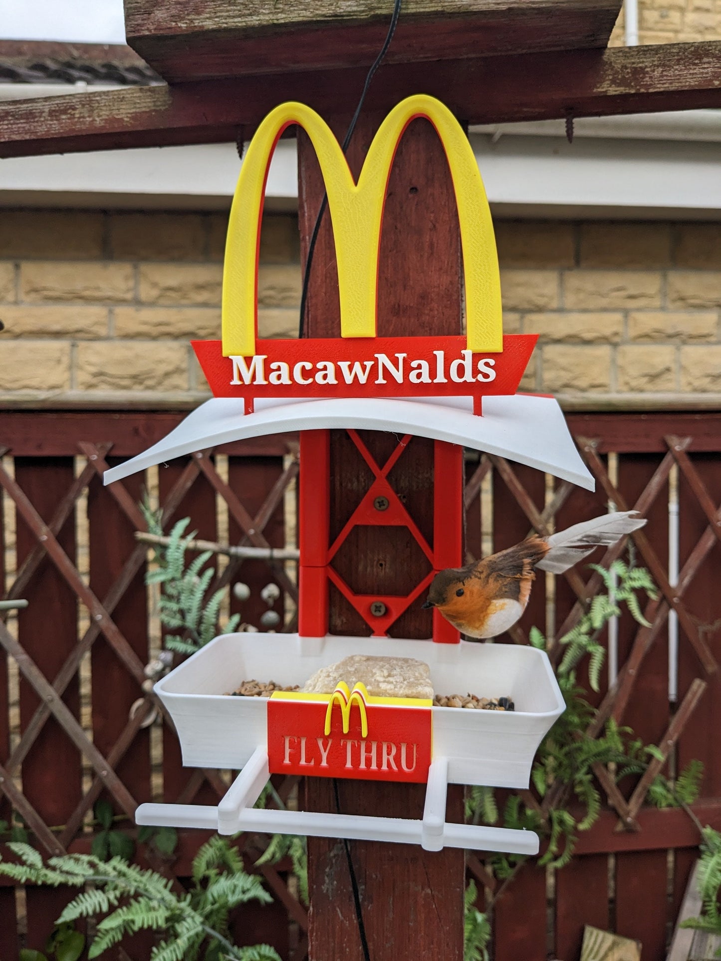 MacawNalds Fly Thru 3d printed bird feeding station. The coolest feeder table takeaway in town for your feathered friends