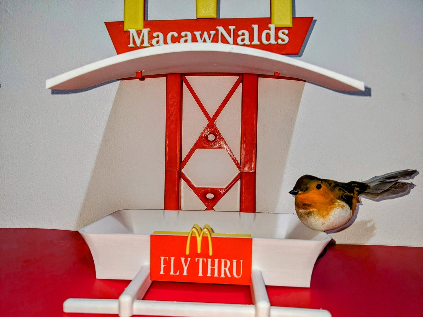 MacawNalds Fly Thru 3d printed bird feeding station. The coolest feeder table takeaway in town for your feathered friends