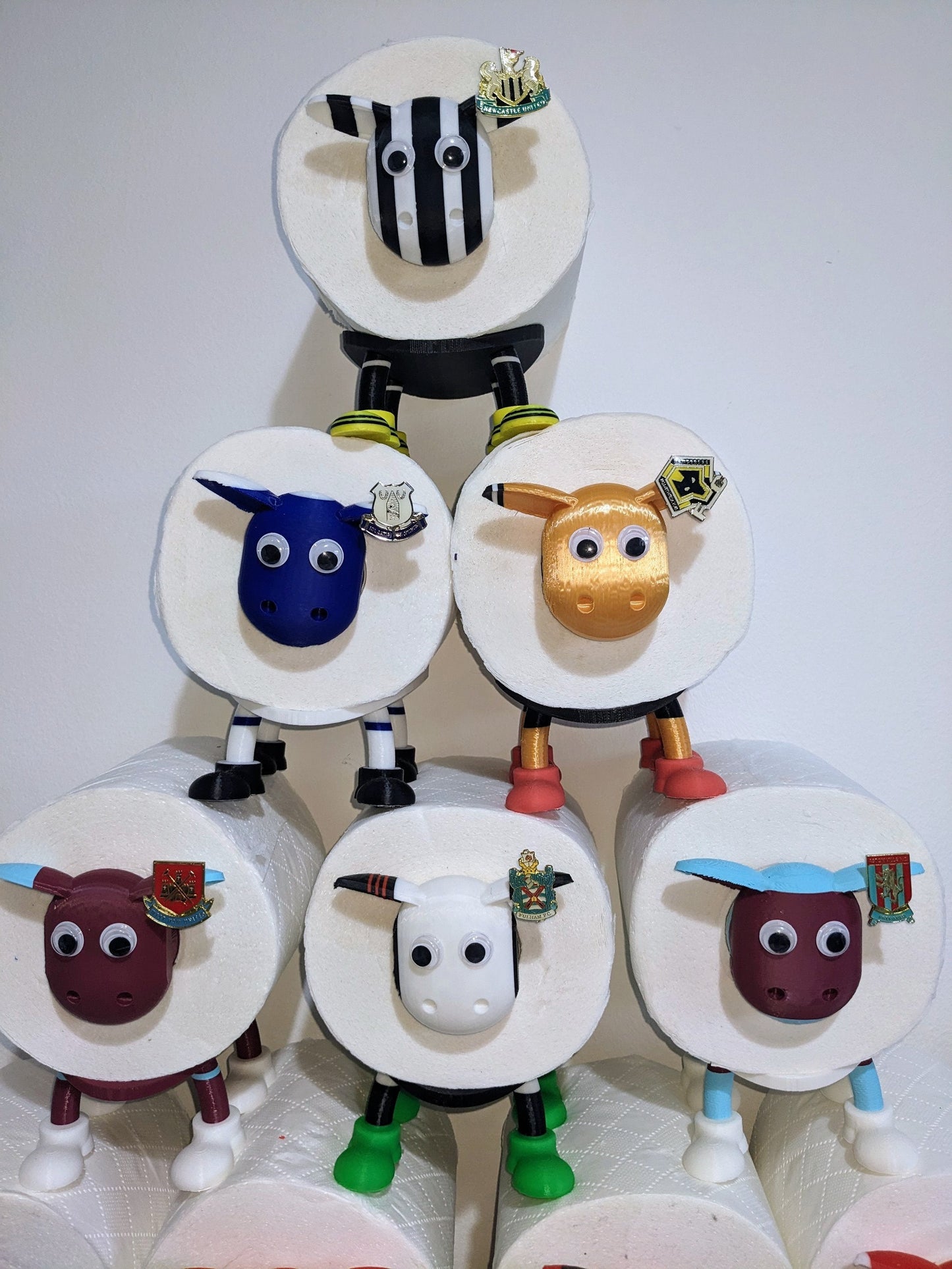 Brentford supporting Premier Sheep spare toilet roll holder with customised choice of the Bees football boots