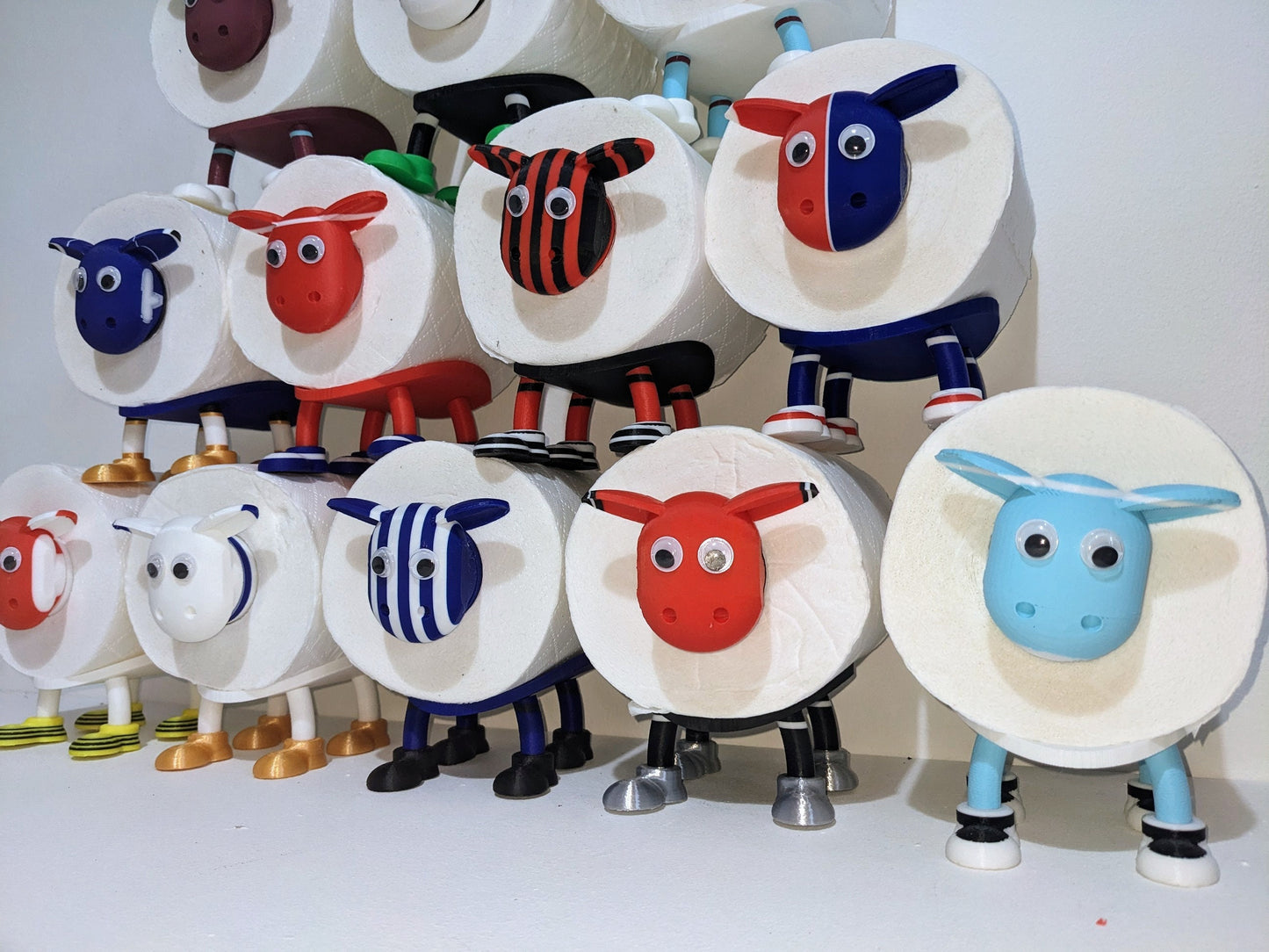 Brentford supporting Premier Sheep spare toilet roll holder with customised choice of the Bees football boots