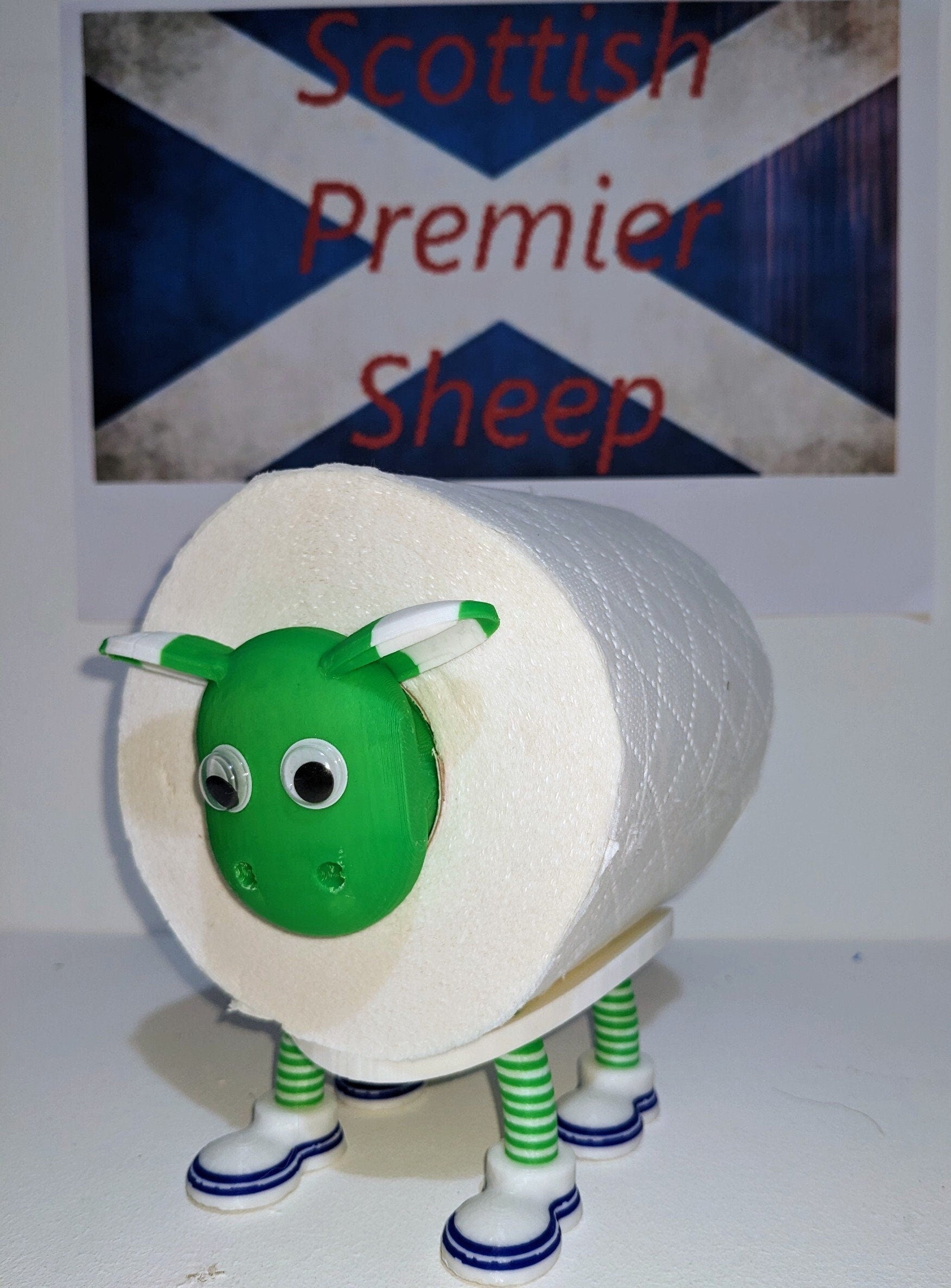 Hibernian FC Scottish Premier Sheep toilet roll holder with the Hibbies customised football boots and hibs pin badge holder.