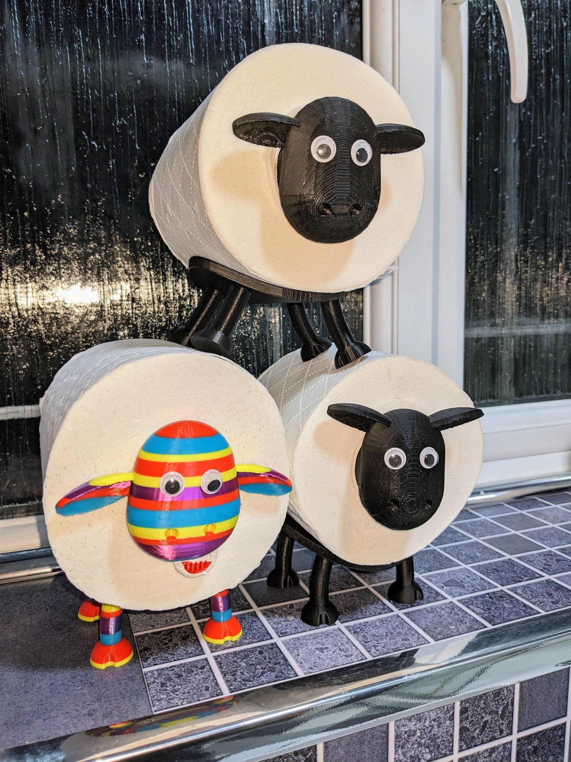 Ewe-Gene the rainbow sheep of the family spare toilet roll holder. The proudest brightest gay LGBTQ+ sheep in the flock.