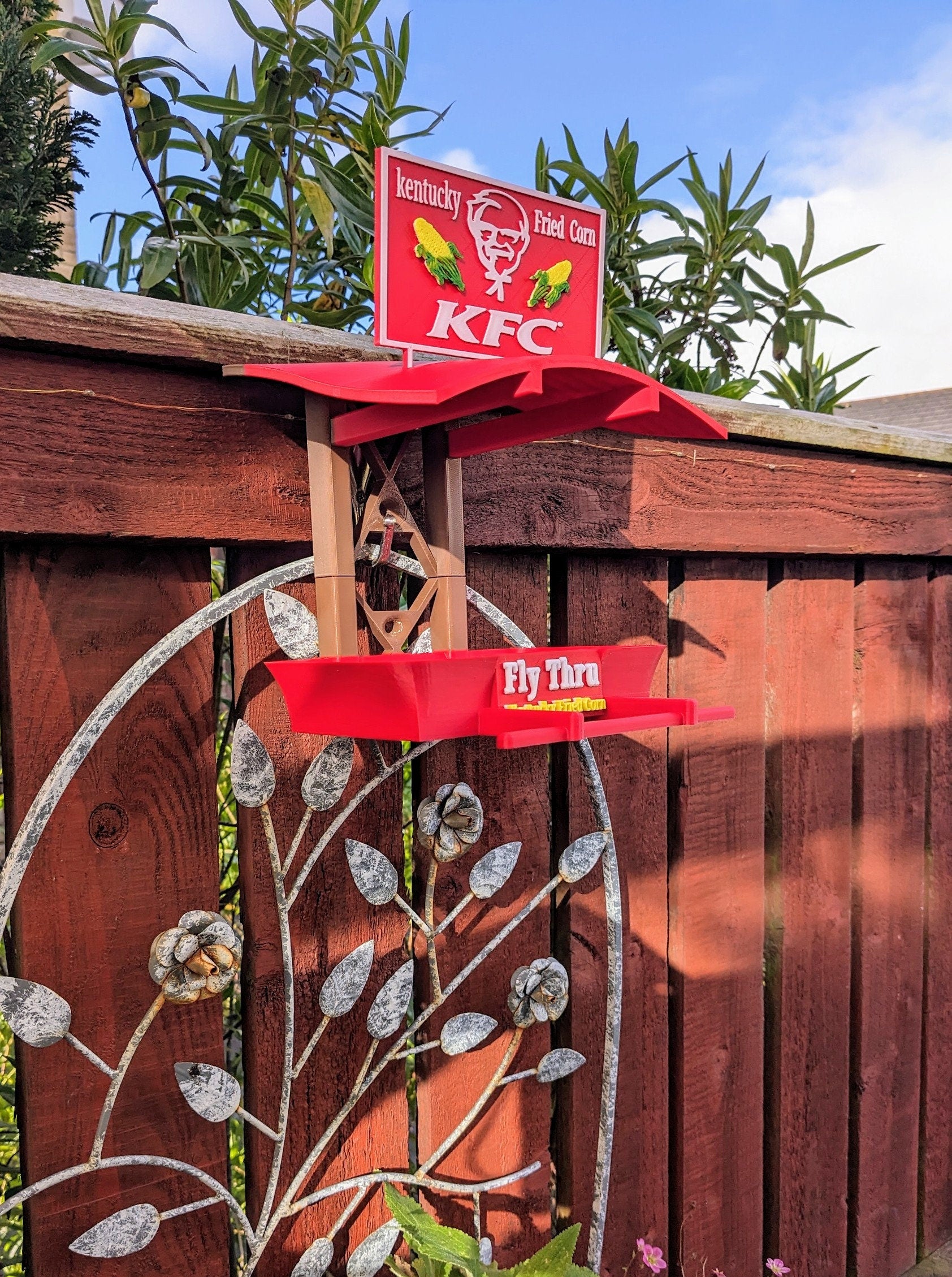 K F C Fly Thru 3d printed bird feeding station. Kentucky fried Corn feeder table for all your feathered friends into fast food takeaways.