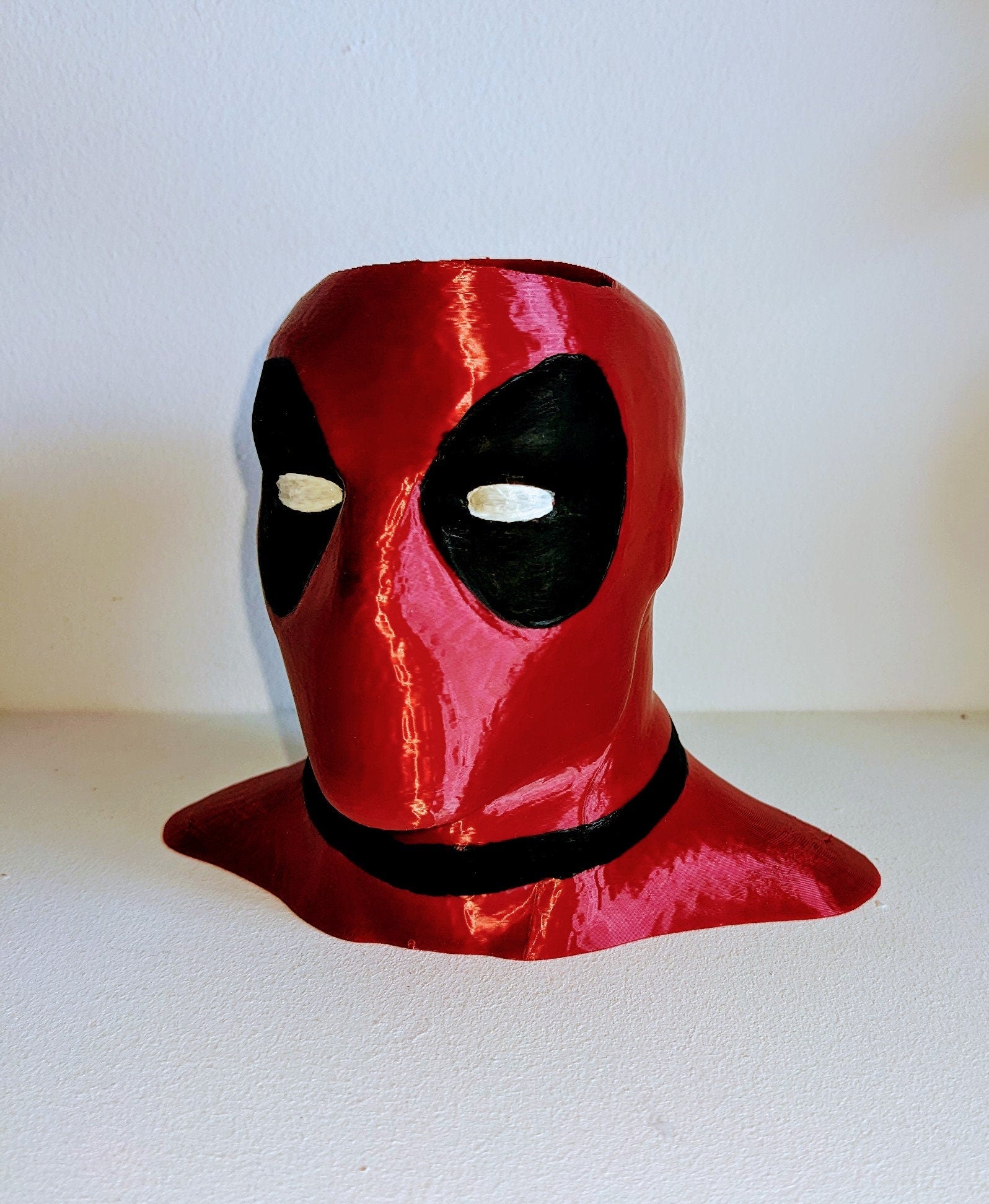 Deadpool toothbrush holder. Marvel universe collectible toothbrush or pen holder.