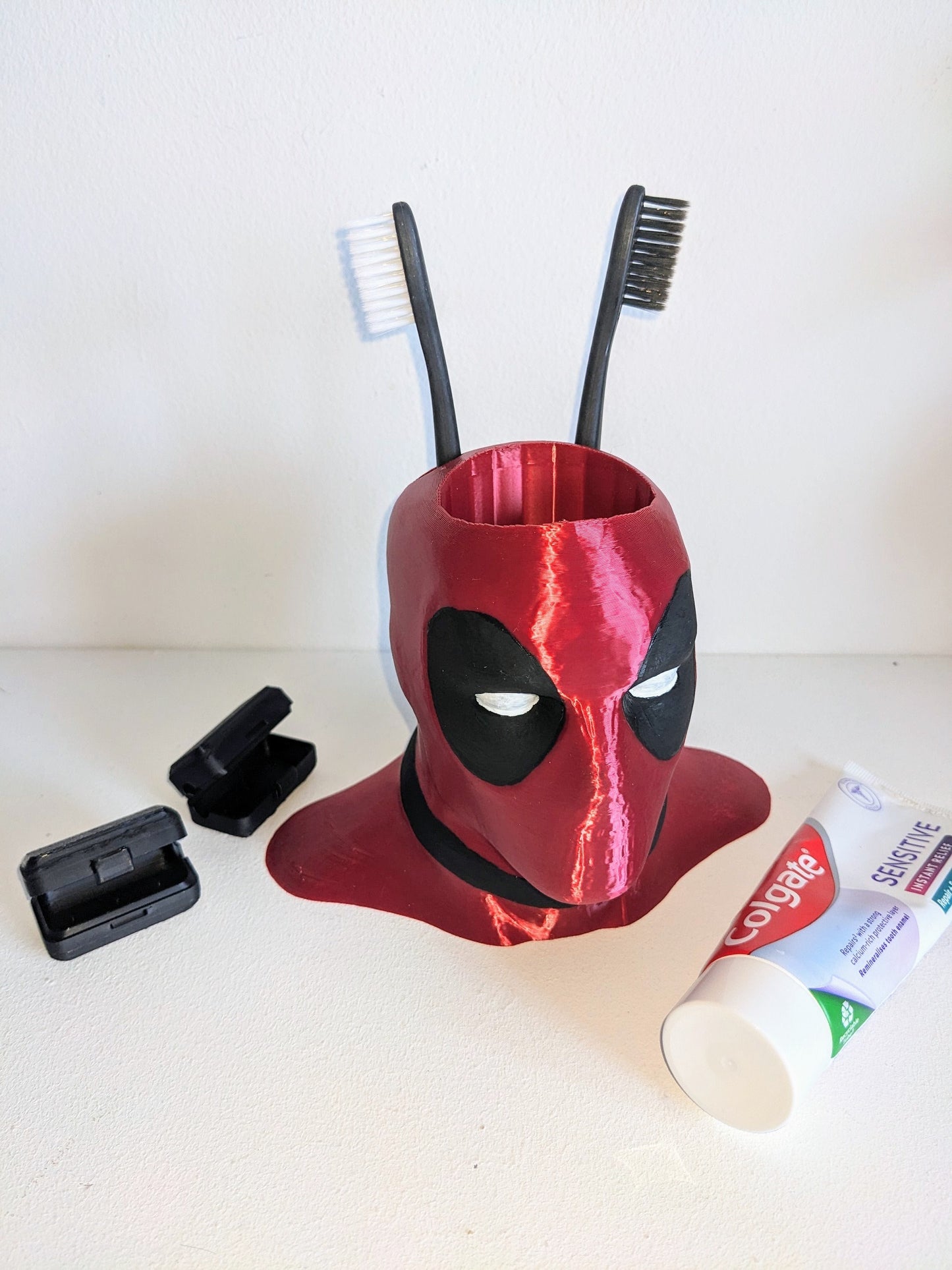 Deadpool toothbrush holder. Marvel universe collectible toothbrush or pen holder.