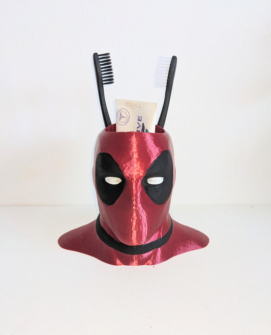 Deadpool toothbrush holder. Marvel universe collectible toothbrush or pen holder.