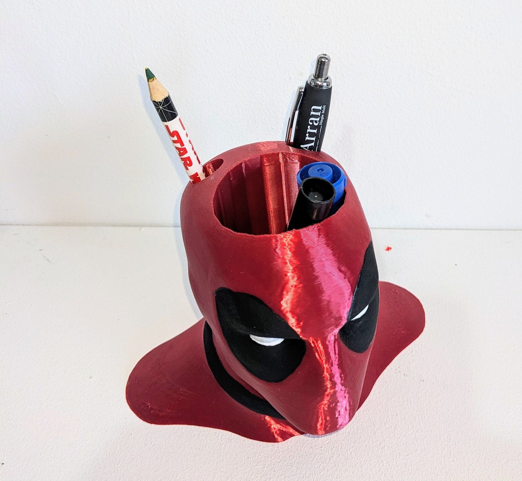 Deadpool toothbrush holder. Marvel universe collectible toothbrush or pen holder.