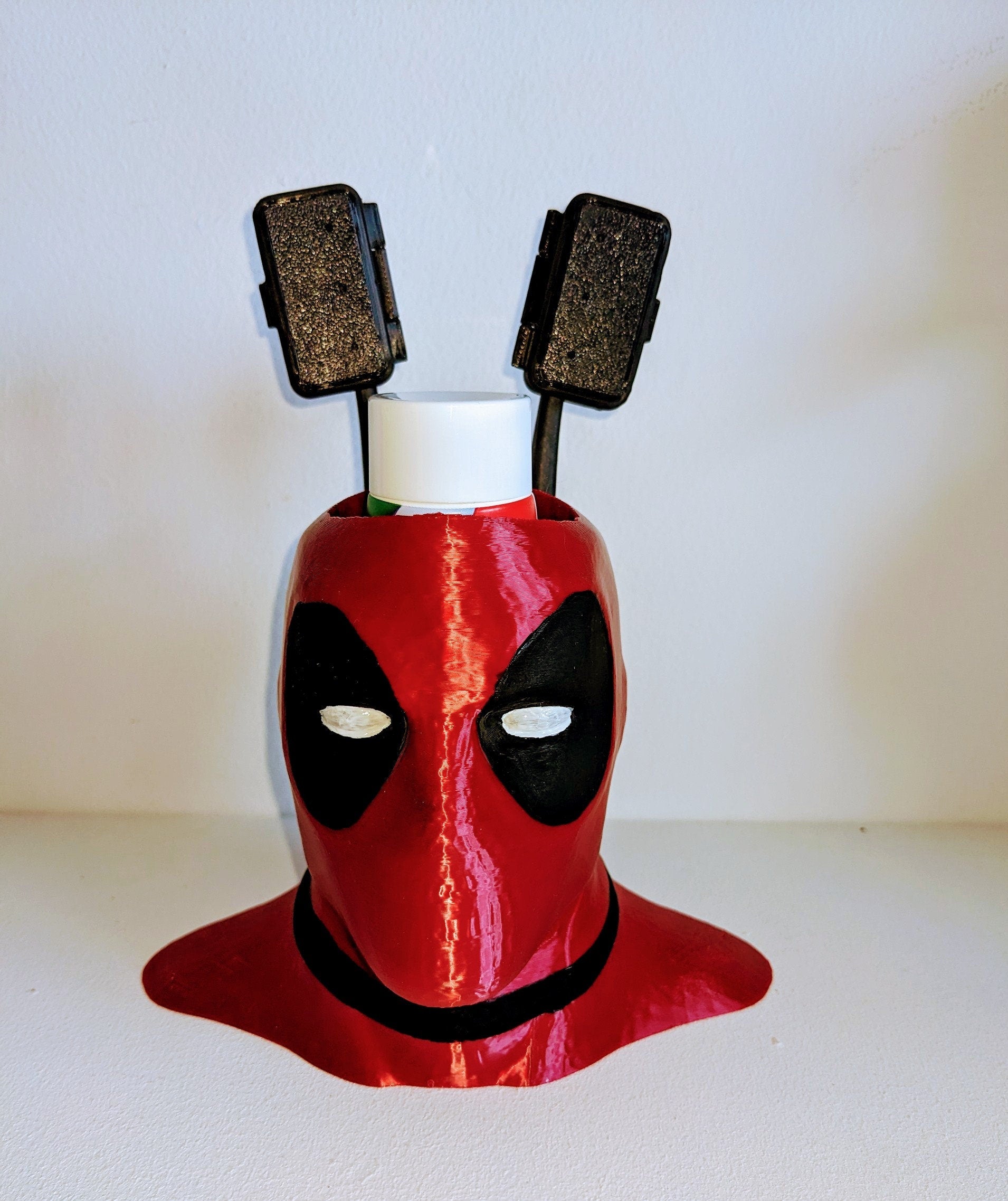 Deadpool toothbrush holder. Marvel universe collectible toothbrush or pen holder.