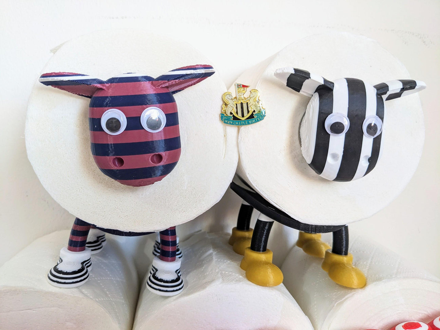 Newcastle United 2025 Premier Sheep spare toilet roll holder / tissue dispenser with customised NUFC football boots. Home OR away shirt