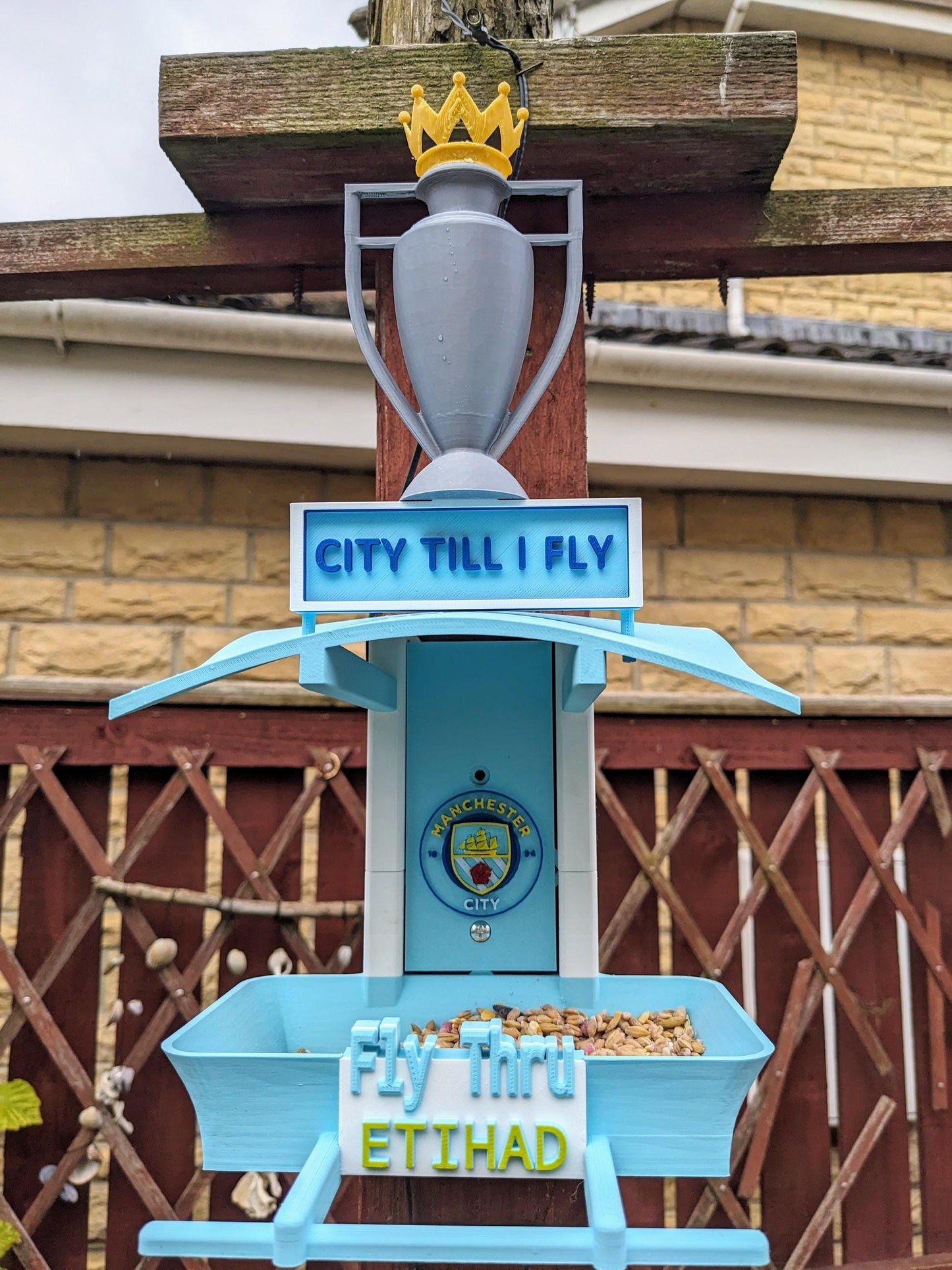 The Rainbow Room 3d printed bird feeding station. The coolest and possibly only LGBTQIA+ rainbow themed bird food table you will ever see.