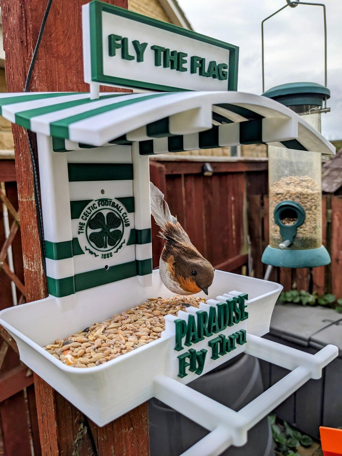 Grebes Fly Thru 3d printed bird feeding station. The coolest feeder table takeaway in town for your feathered friends. Seed, Fat ball