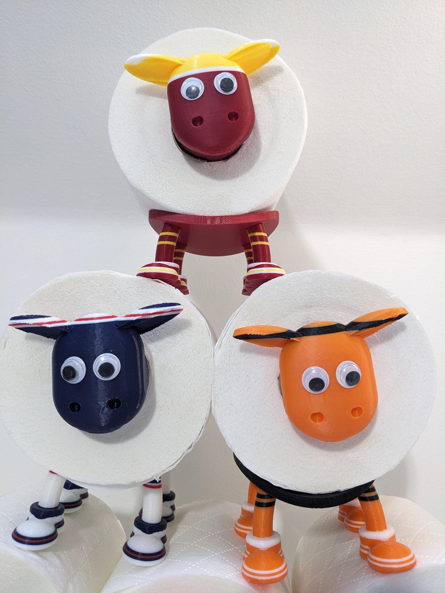 Dundee United Scottish Premier Sheep toilet roll holder. 2025 Home shirts with the Arabs customised football boots.