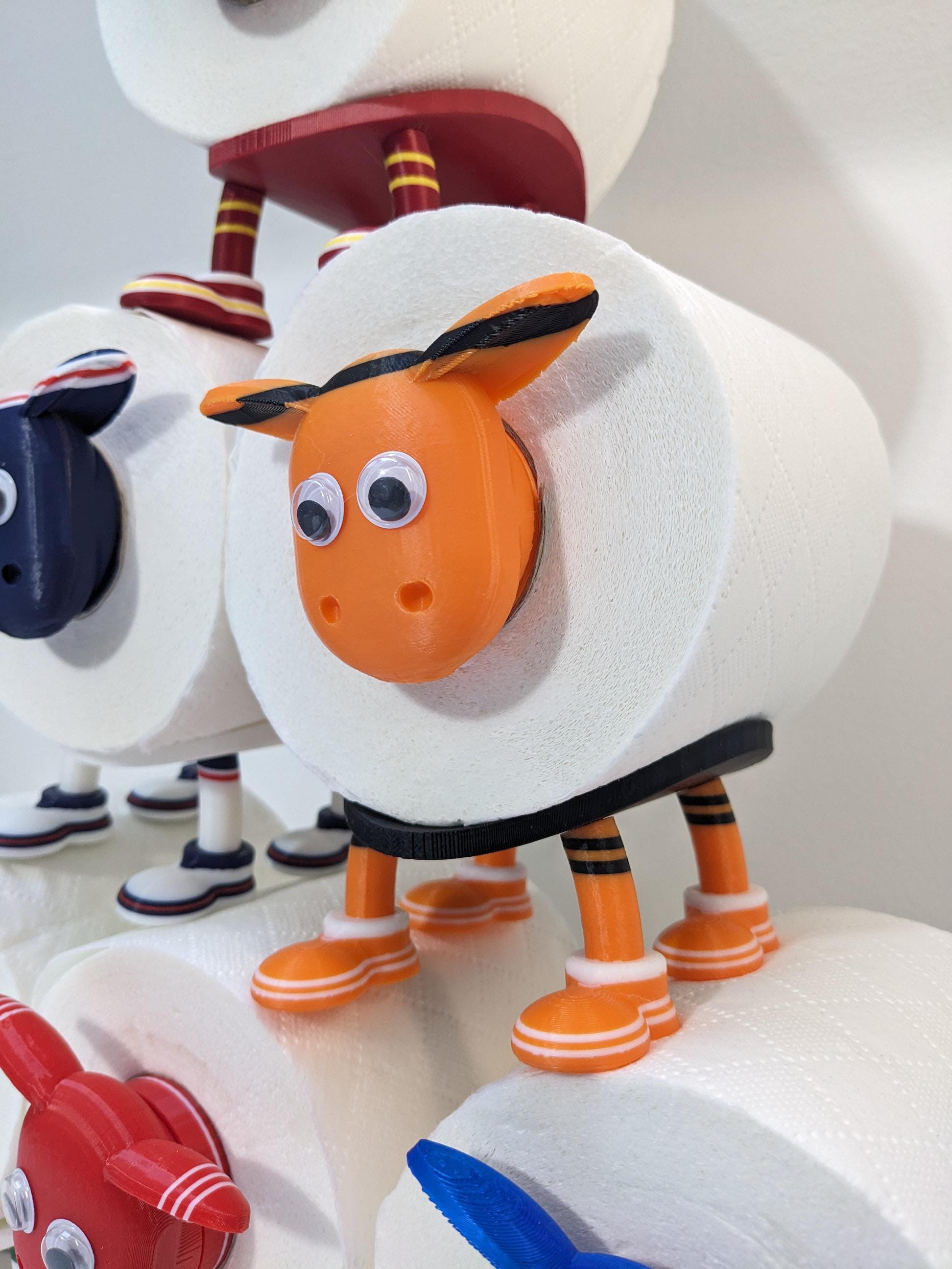 Dundee United Scottish Premier Sheep toilet roll holder. 2025 Home shirts with the Arabs customised football boots.