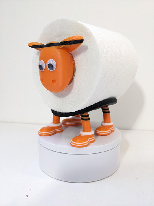 Dundee United Scottish Premier Sheep toilet roll holder. 2025 Home shirts with the Arabs customised football boots.