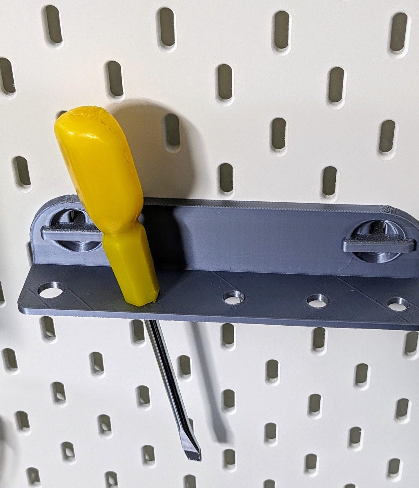 Skadis compatible screwdriver tool holder. Heavy duty mini shelf with 5 holes for Ikea pegboard.