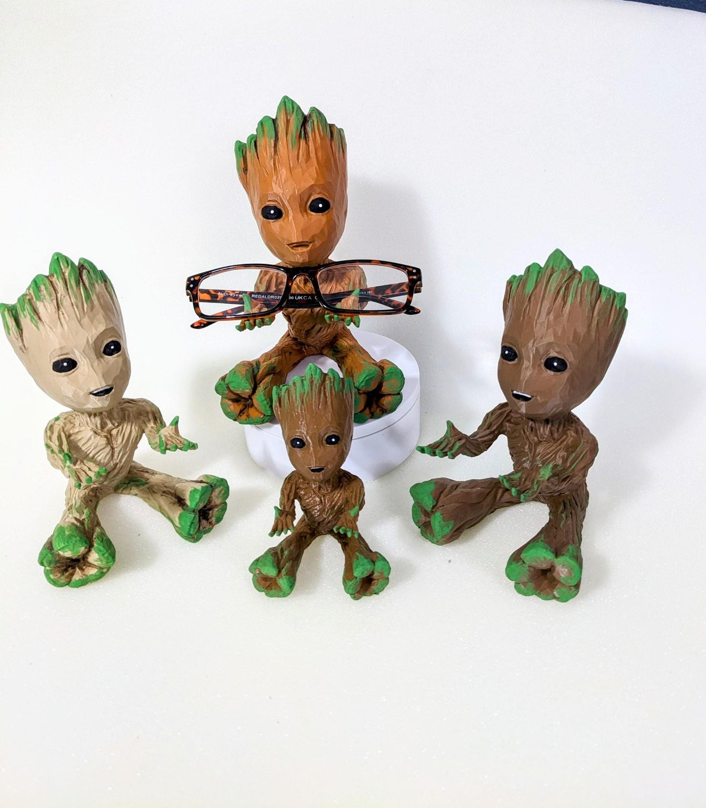 Baby Groot universal holder for remote control glasses rings pens watches mobiles game controllers