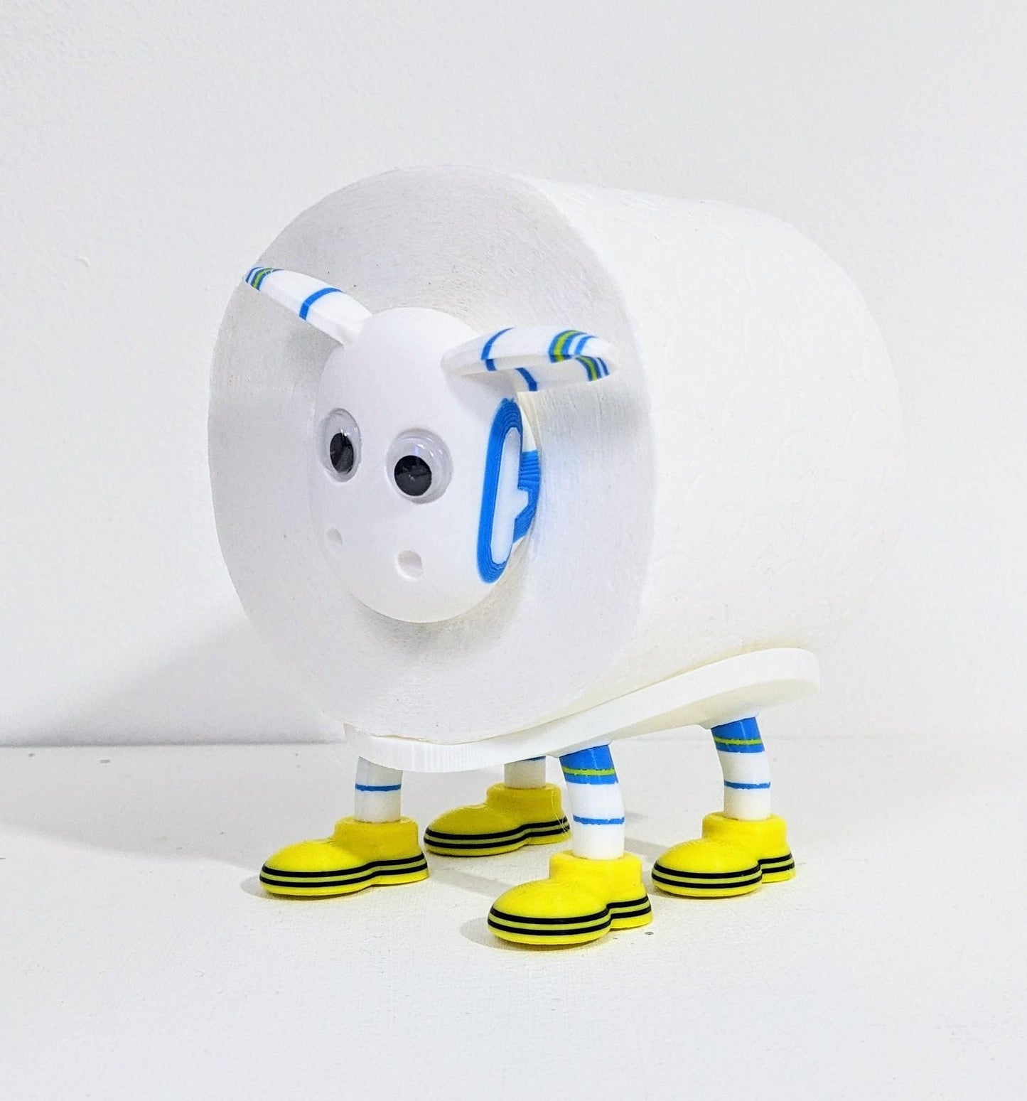 Leeds United 2025 Champion Sheep spare toilet roll holder with customised choice of football boots