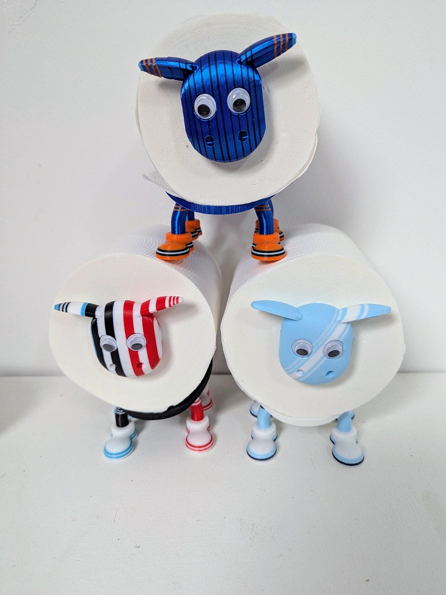 Premiersheep Newcastle United Toilet roll holder featuring the "Shepherds Check" and "Greggs blue" trim for the 2025/26 season Universal fit