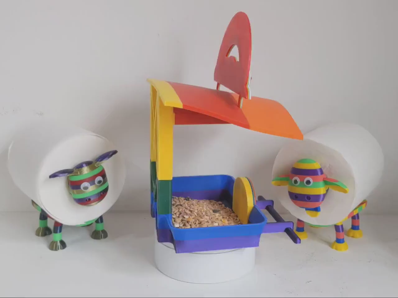 The Rainbow Room 3d printed bird feeding station. The coolest and possibly only LGBTQIA+ rainbow themed bird food table you will ever see.